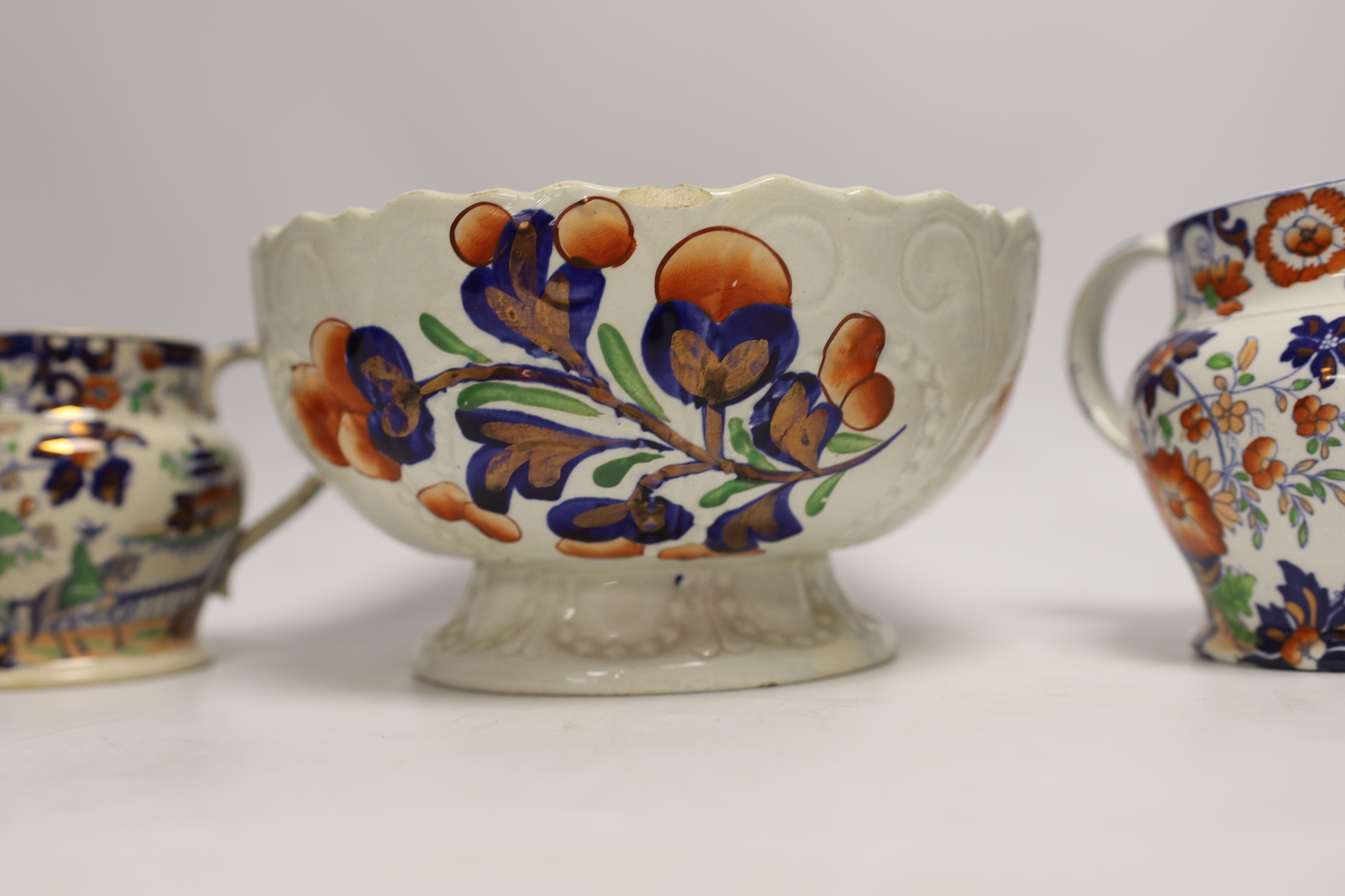 Five Welsh ‘Gaudy’ coffee cans, a large pedestal bowl and two Staffordshire jugs, bowl 21cm diameter